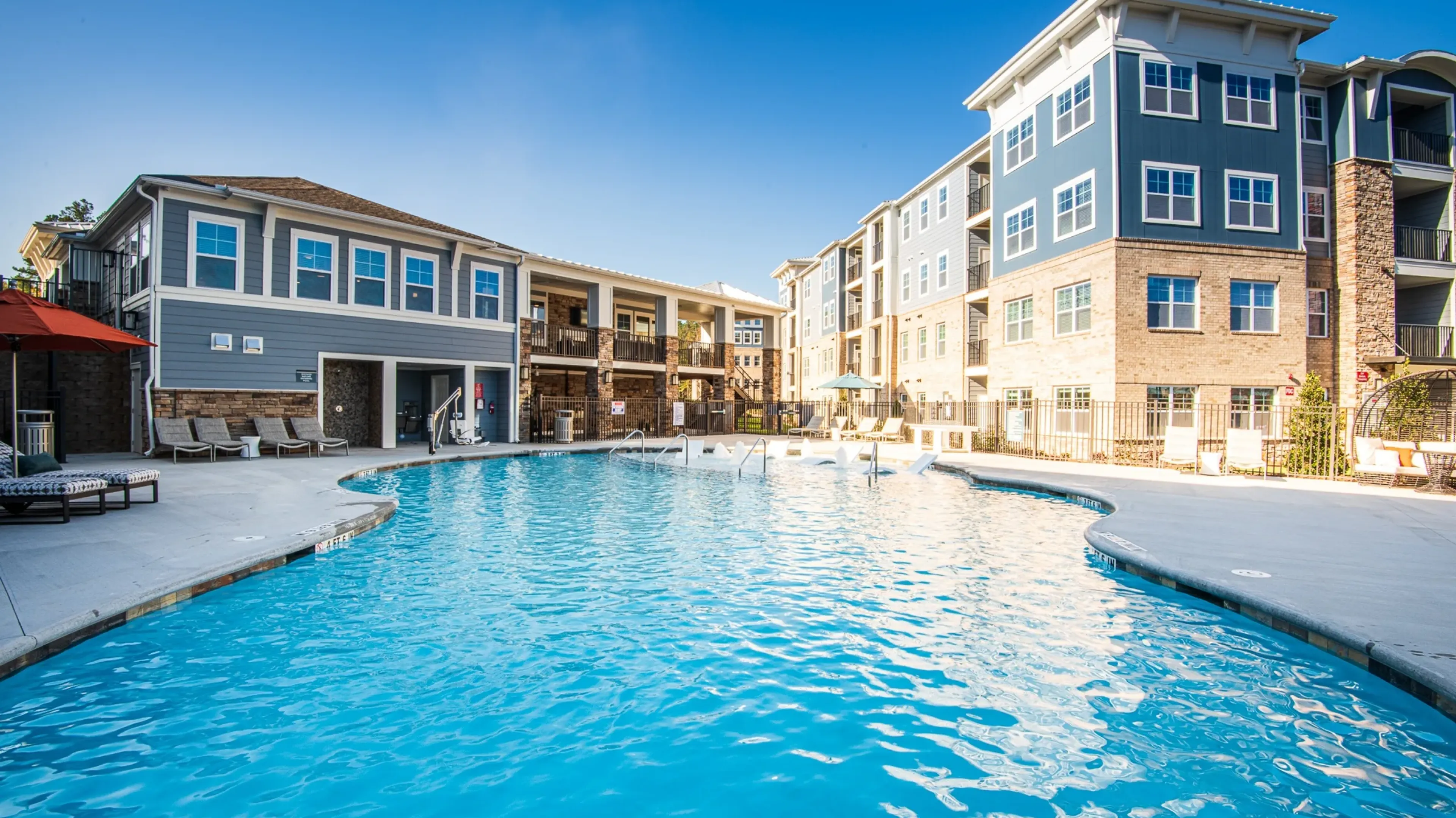 Hawthorne at Parkside pool with apartment buildings